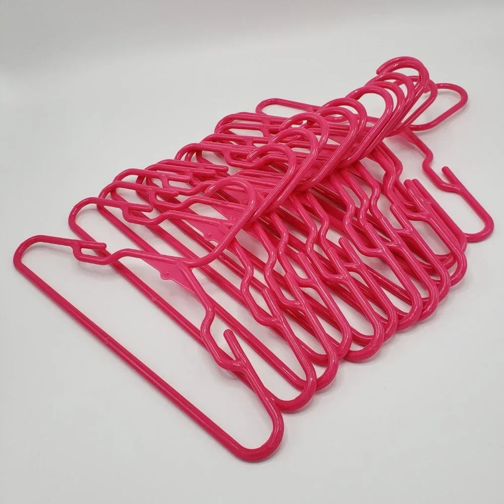 Lot of 17 Childrens Kids Clothes Hangers Plastic 16 Top Notched and 1 Pant Clips